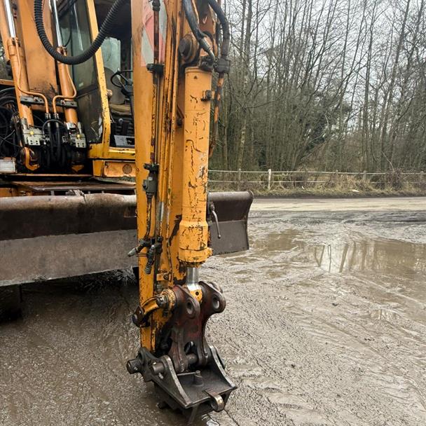 Case Poclain 688B Wheeled Excavator Rubber Duck With Blade