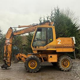 Case Poclain 688B Wheeled Excavator Rubber Duck With Blade