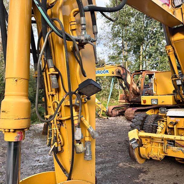 O & K MH5 Wheeled Excavator With Railway Gear, 3 Piece Boom And Hydraulic Jack Legs