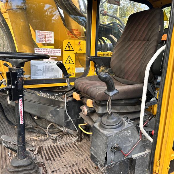 O & K MH5 Wheeled Excavator With Railway Gear, 3 Piece Boom And Hydraulic Jack Legs