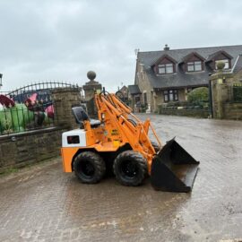 KOMATSU SK04 WHEELED SKIDSTEER LOADER