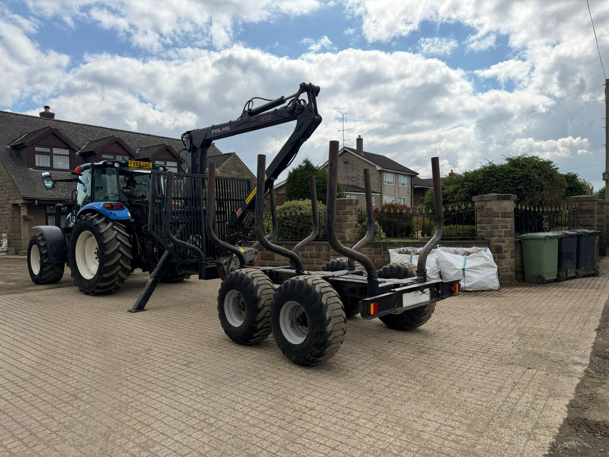 2012 PALMS 101 TWIN AXLE LOGGING TRAILER WITH ROTATING LOG GRAB