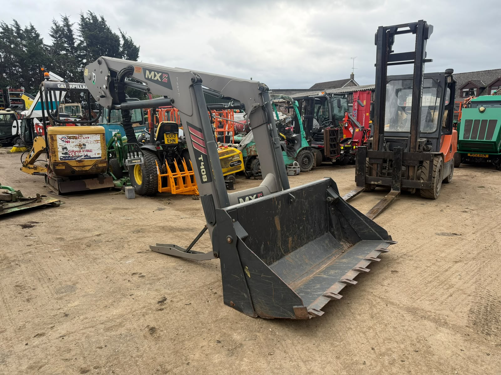 2015 MX T408 FRONT LOADER W/ 4 IN 1 BUCKET